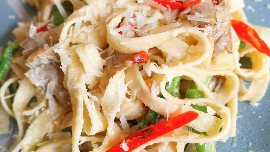 Creamy Egg Yolk Carbonara Fettuccine with Sauteed Asparagus and Mushrooms